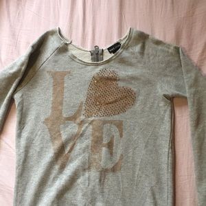 Grey love sweater that zips in the back